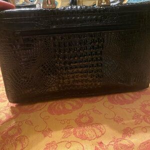 Real Leather ( I believe alligator)